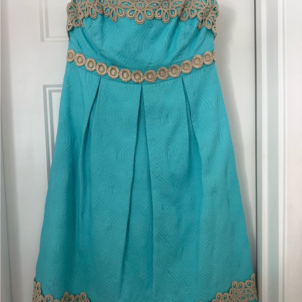 Elegant Turquoise Strapless Dress with Gold Accents